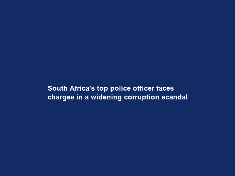 South Africa’s top police officer faces charges in a widening corruption scandal